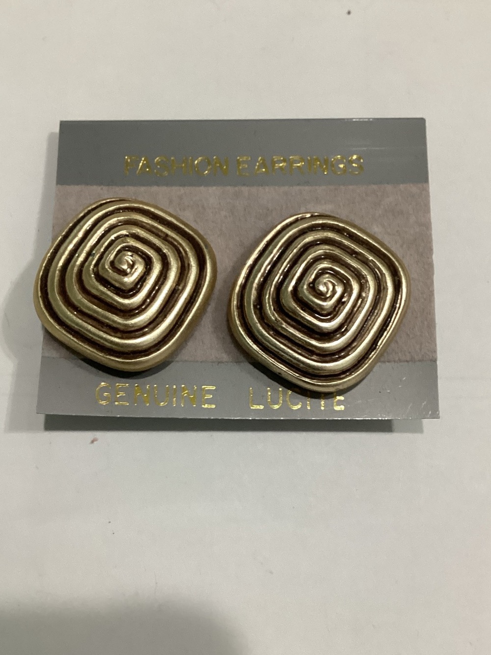 Gold Spiral clip on Earrings
